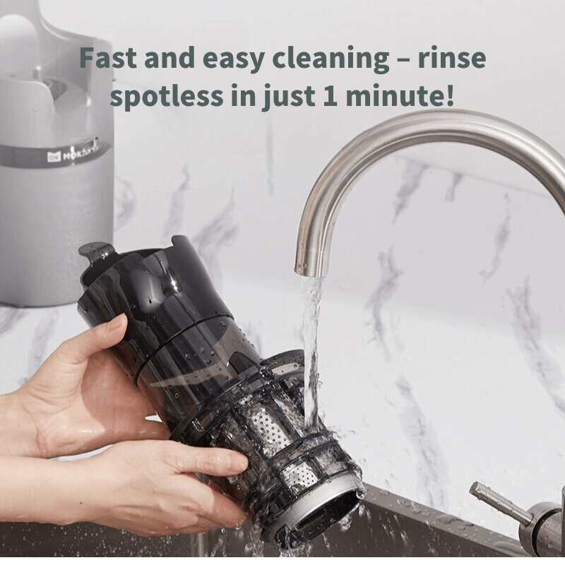 Easy to clean juicer part rinsing under a kitchen faucet for fast maintenance